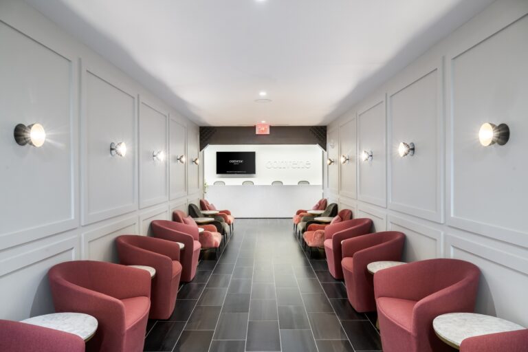 White hallway entrance to Convene One Boston Place