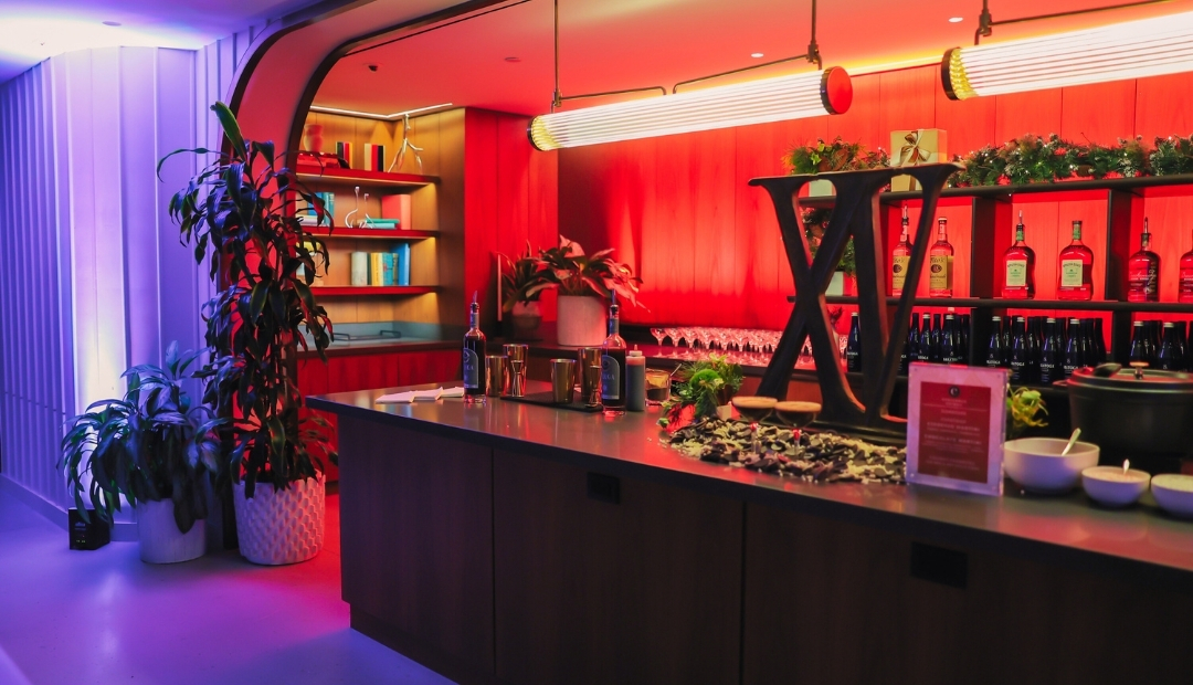 Holiday Lighting and Bar Display ay Club 75 by Convene for 2024 Christmas Tree Lighting Event