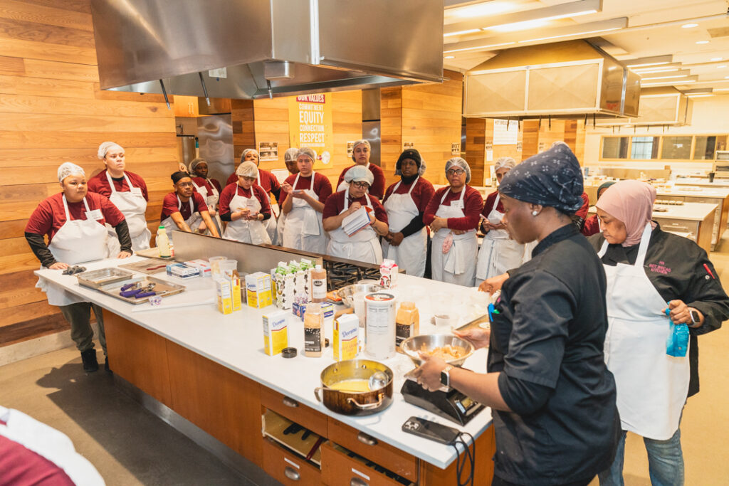 Convene and Hot Bread Kitchen partnership, image shows culinary fundamentals cooking demo